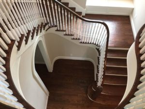 Red oak and white painted circular staircase