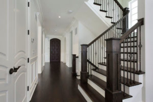 Dark Stained wood and white staircase