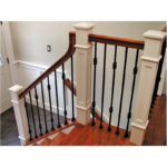 Interior Stair Railing with Double Ball Iron Balusters and White Wood Newel Posts